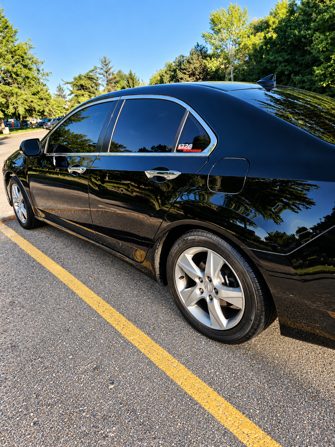 Glossy black Acura after a full detail